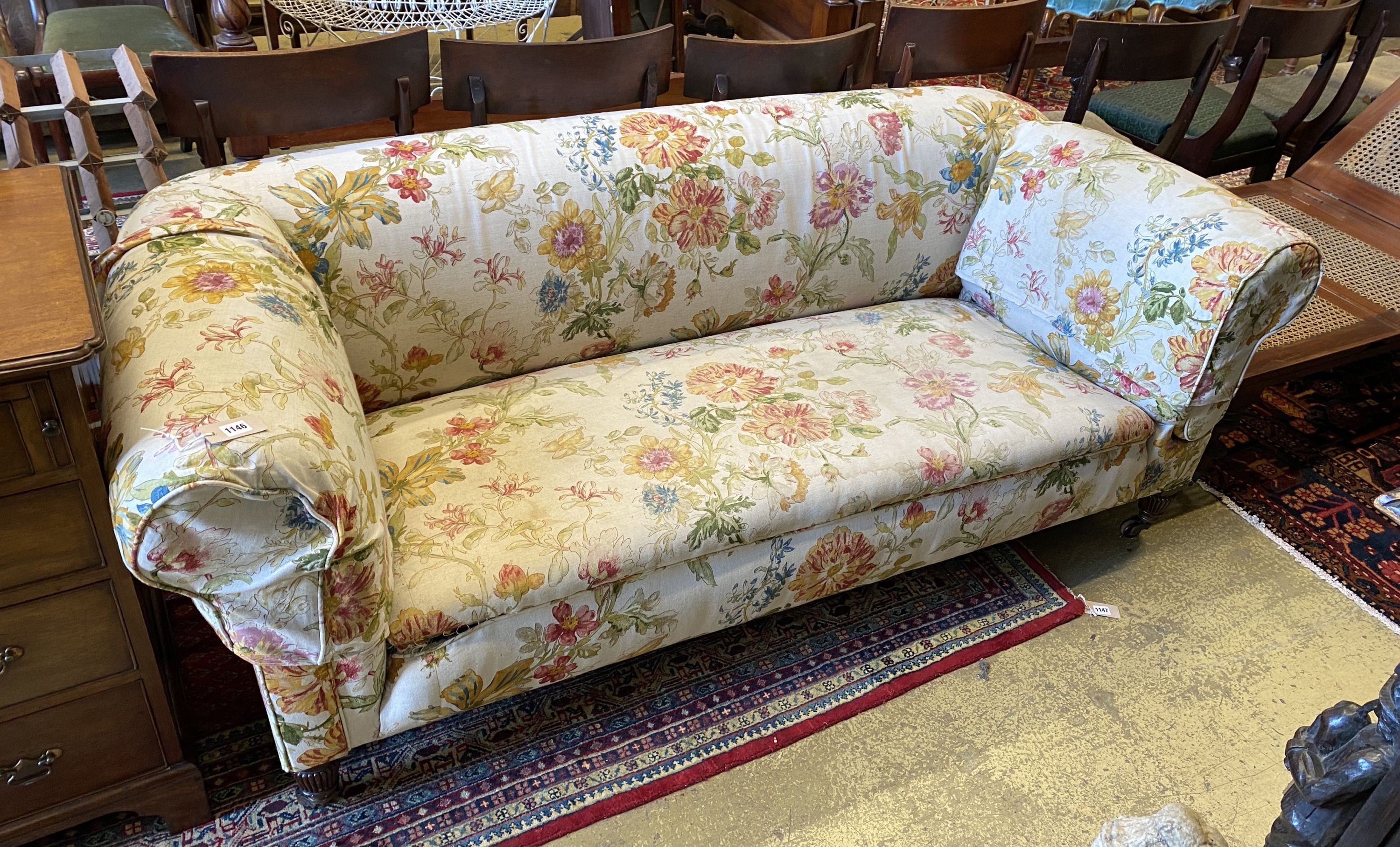 A Victorian drop end Chesterfield settee with Colefax & Fowler upholstery, length 200cm, depth 88cm, height 73cm